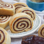 close up of kleicha Iraqi date cookies on plate