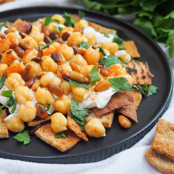 part view of plate of chickpea fatteh from side