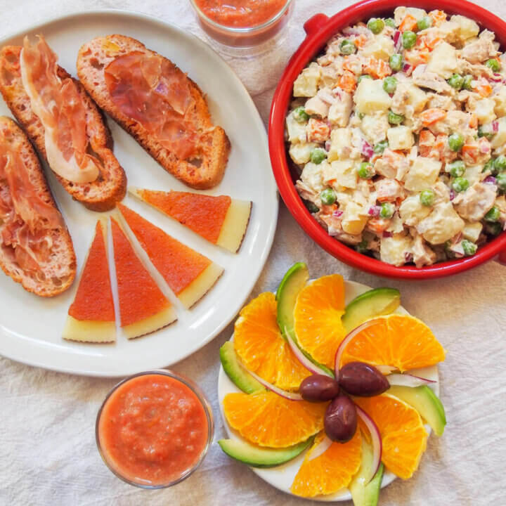 close view of plates with easy Spanish cold tapas