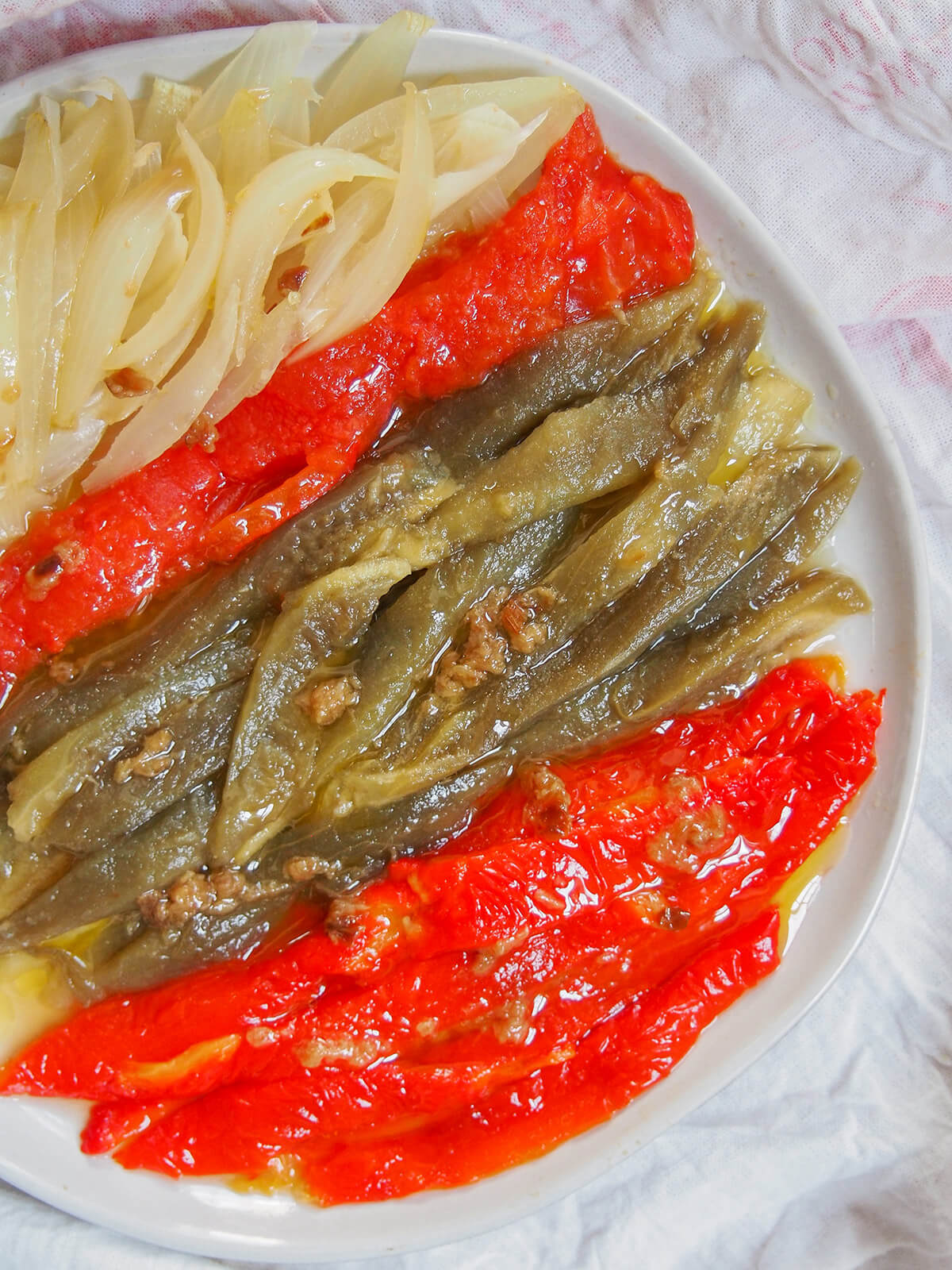part view of plate of escalivada Catalan roast vegetables from overhead