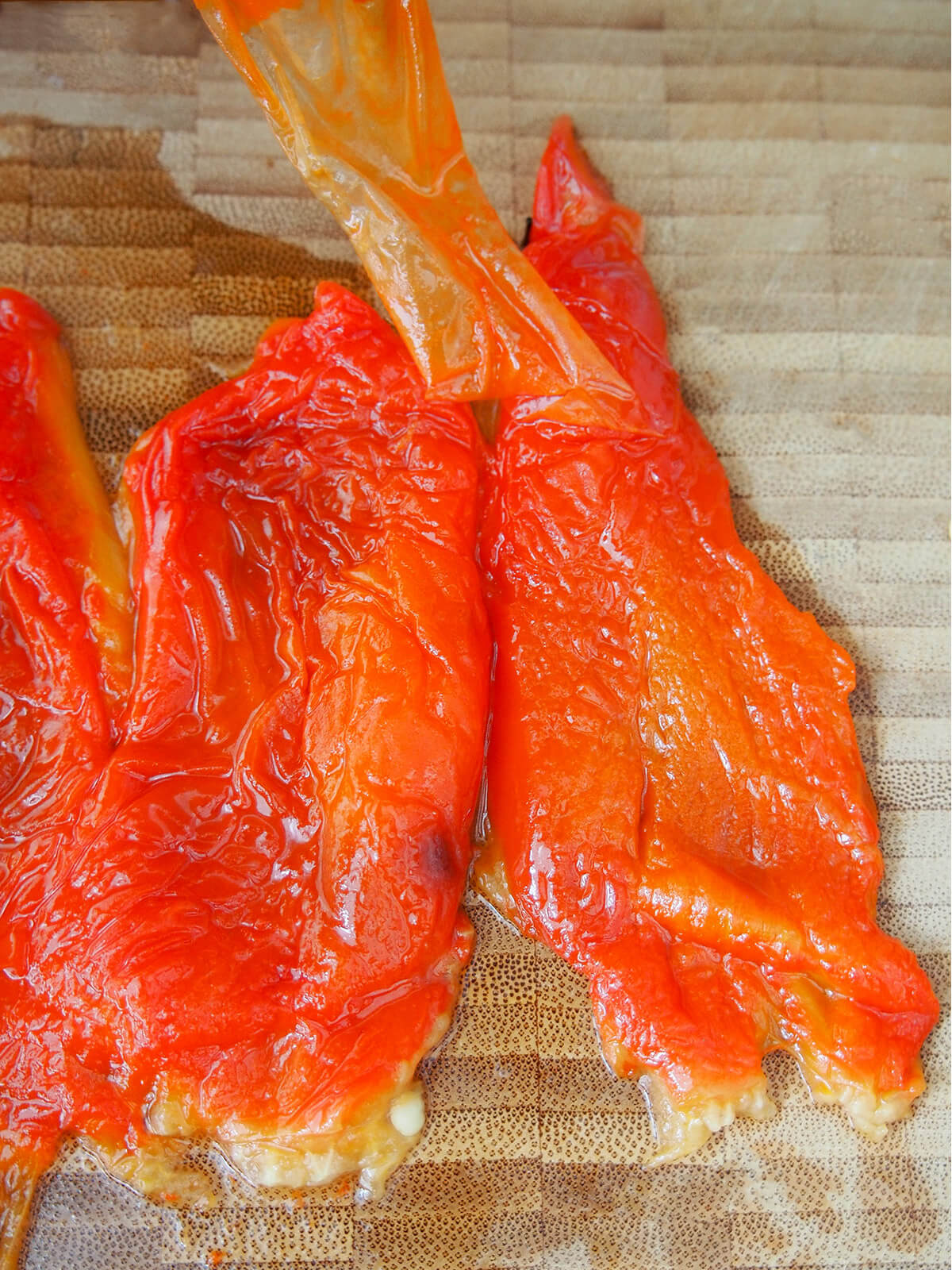 peeling skin form cooked red pepper
