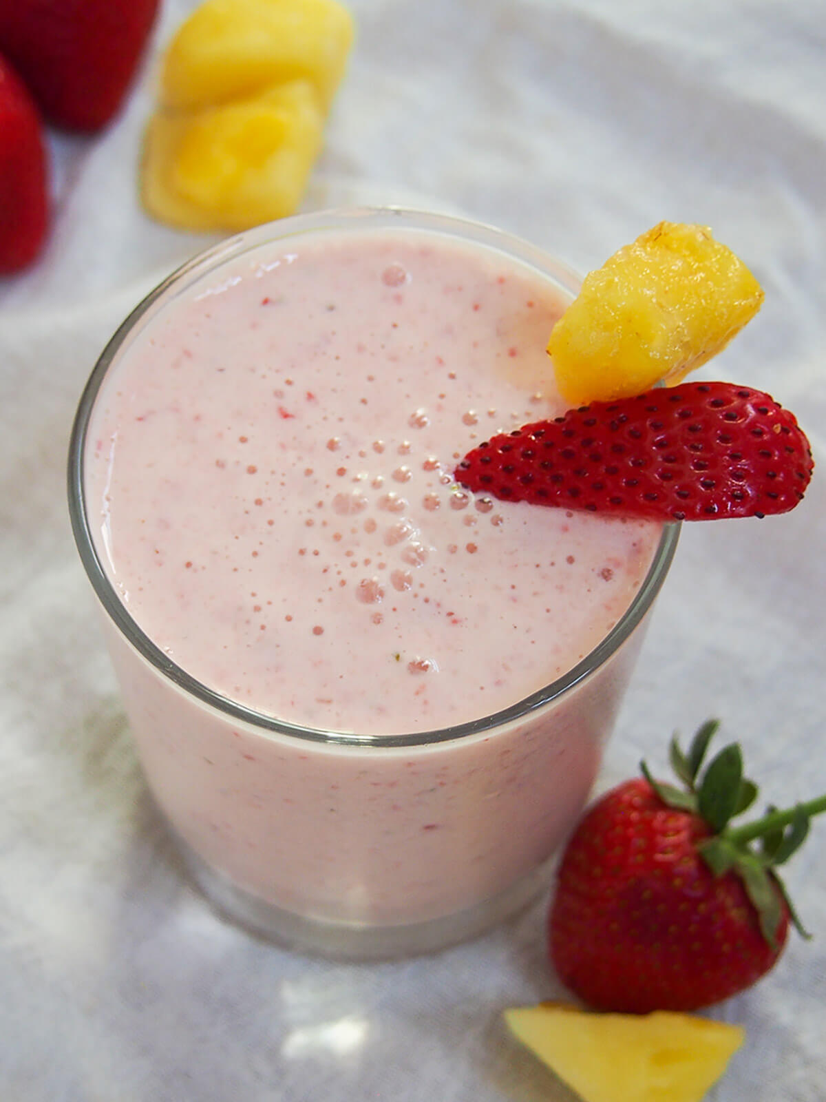close up view strawberry pineapple smoothie