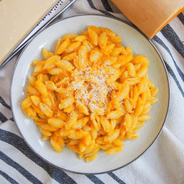 plate of butternut squash pasta sauce over pasta