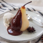 poached pear with chocolate sauce and ice cream aka poires belle Helene