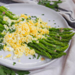 plate of asparagus mimosa from side