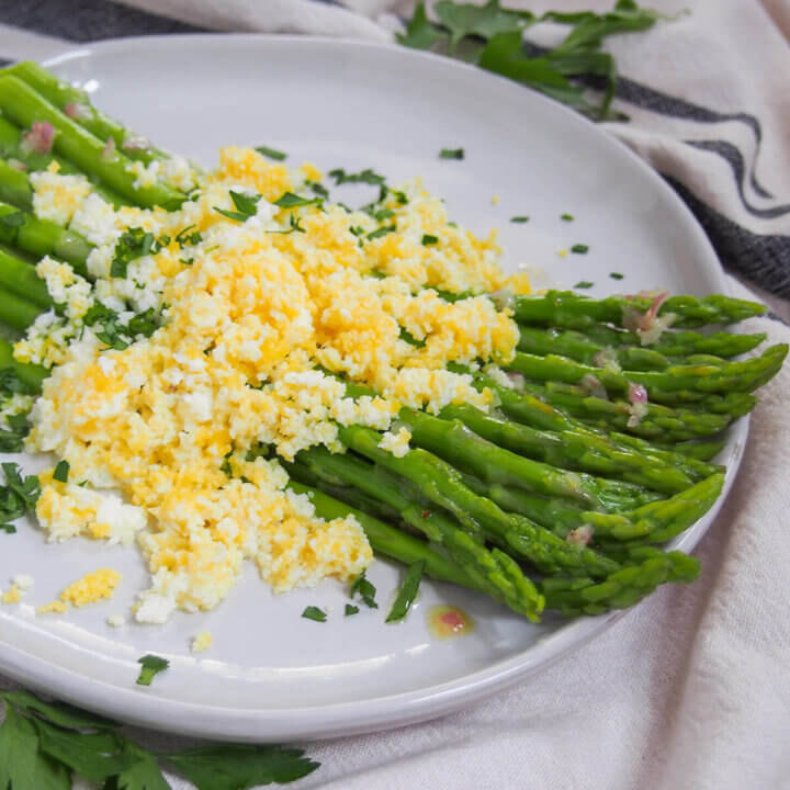 plate of asparagus mimosa from side