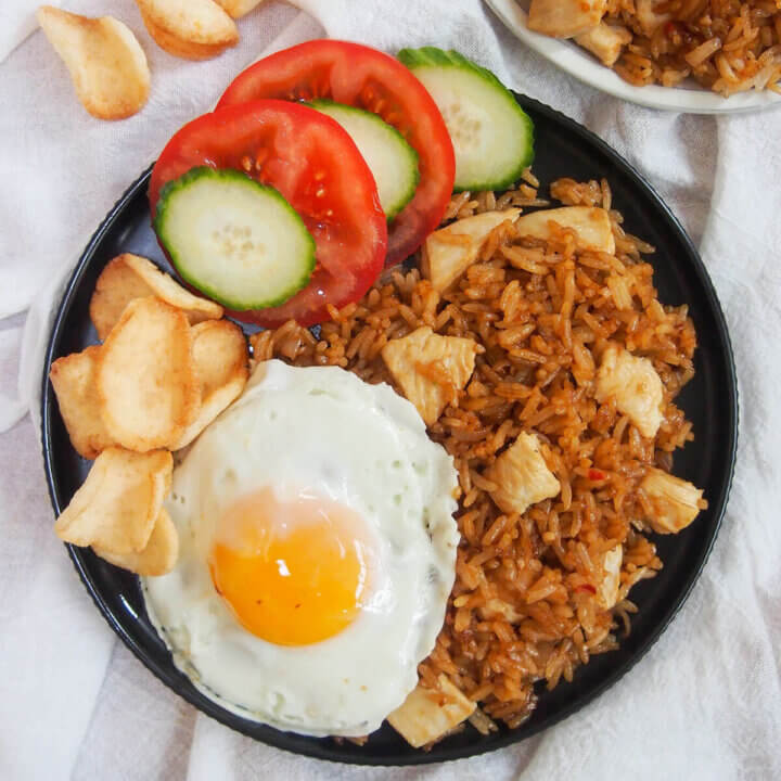 overhead view of plate of nasi goreng Indonesian fried rice