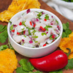 bowl of scallop ceviche on board