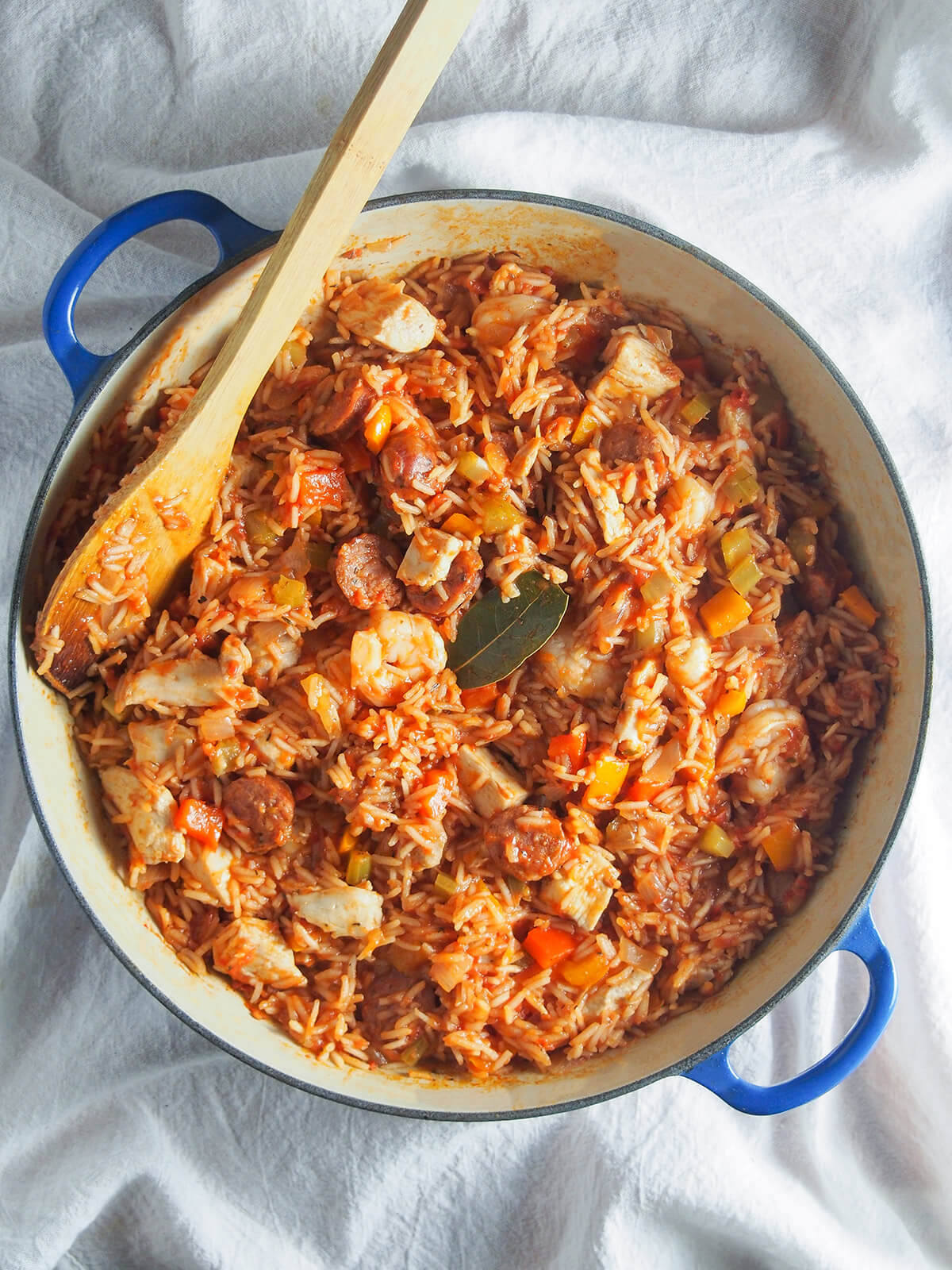 overhead view of dish of Creole jambalaya with spoon to side of dish