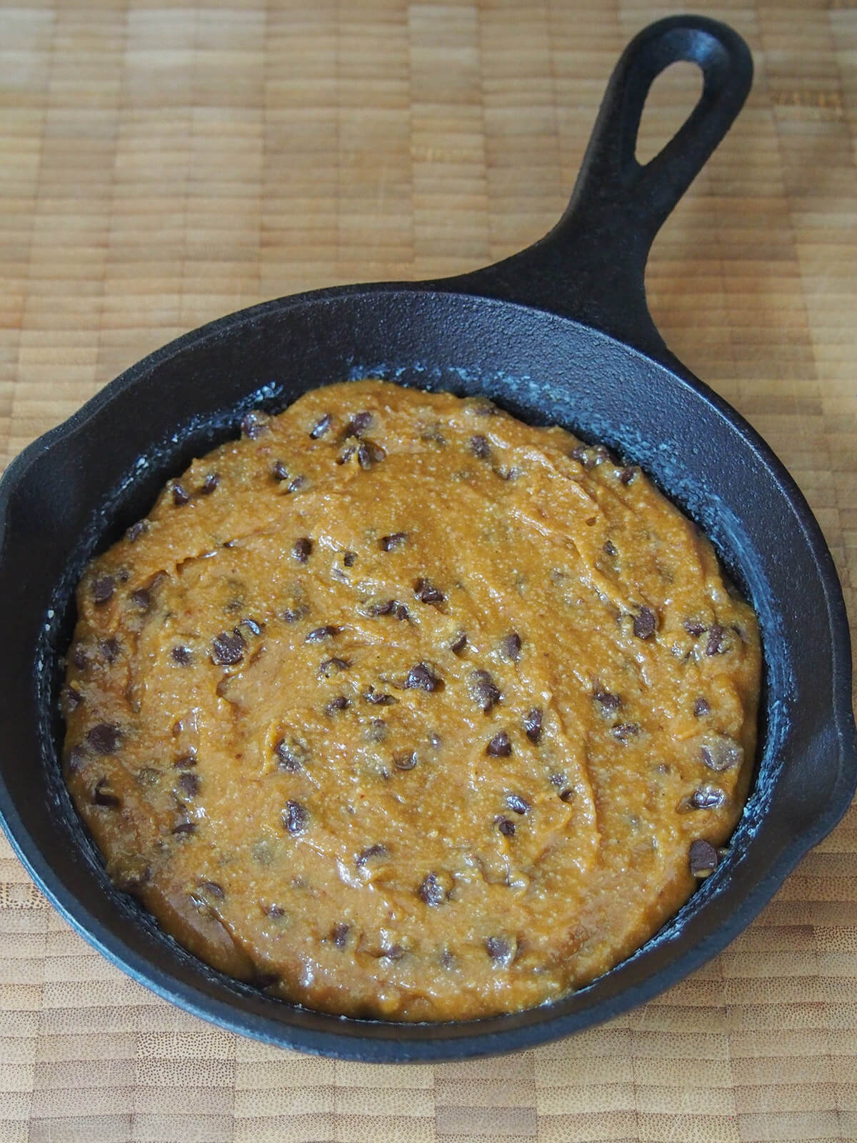 cookie dough in skillet before baking