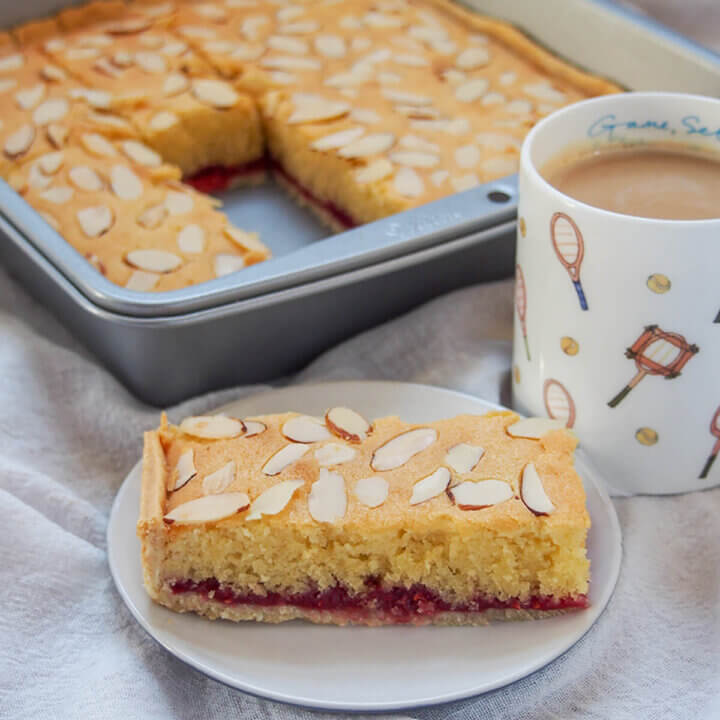slice of Bakewell slice in front of pan with rest of slice in it