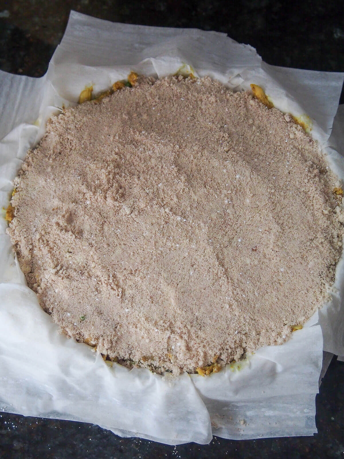 nut layer over chicken in pastry