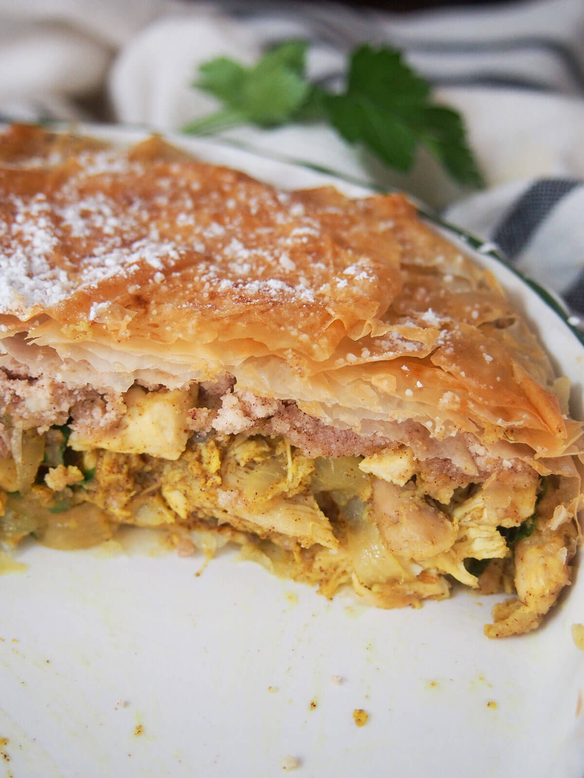 pastilla in dish from side showing filling layers