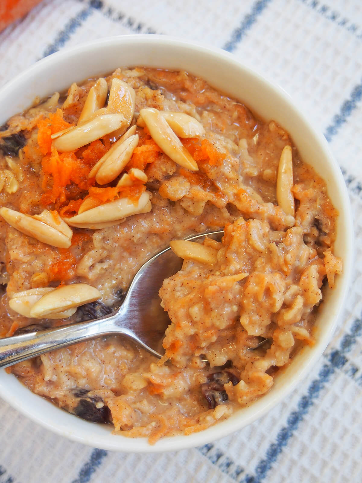 spoon in bowl of carrot cake oatmeal