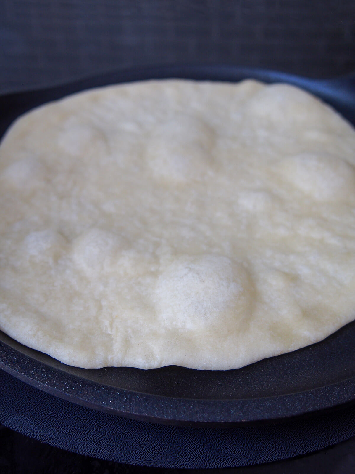 piadina flatbread bubbling up as it cooks
