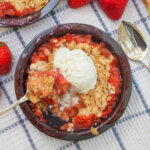 dish of strawberry rhubarb crisp from overhead