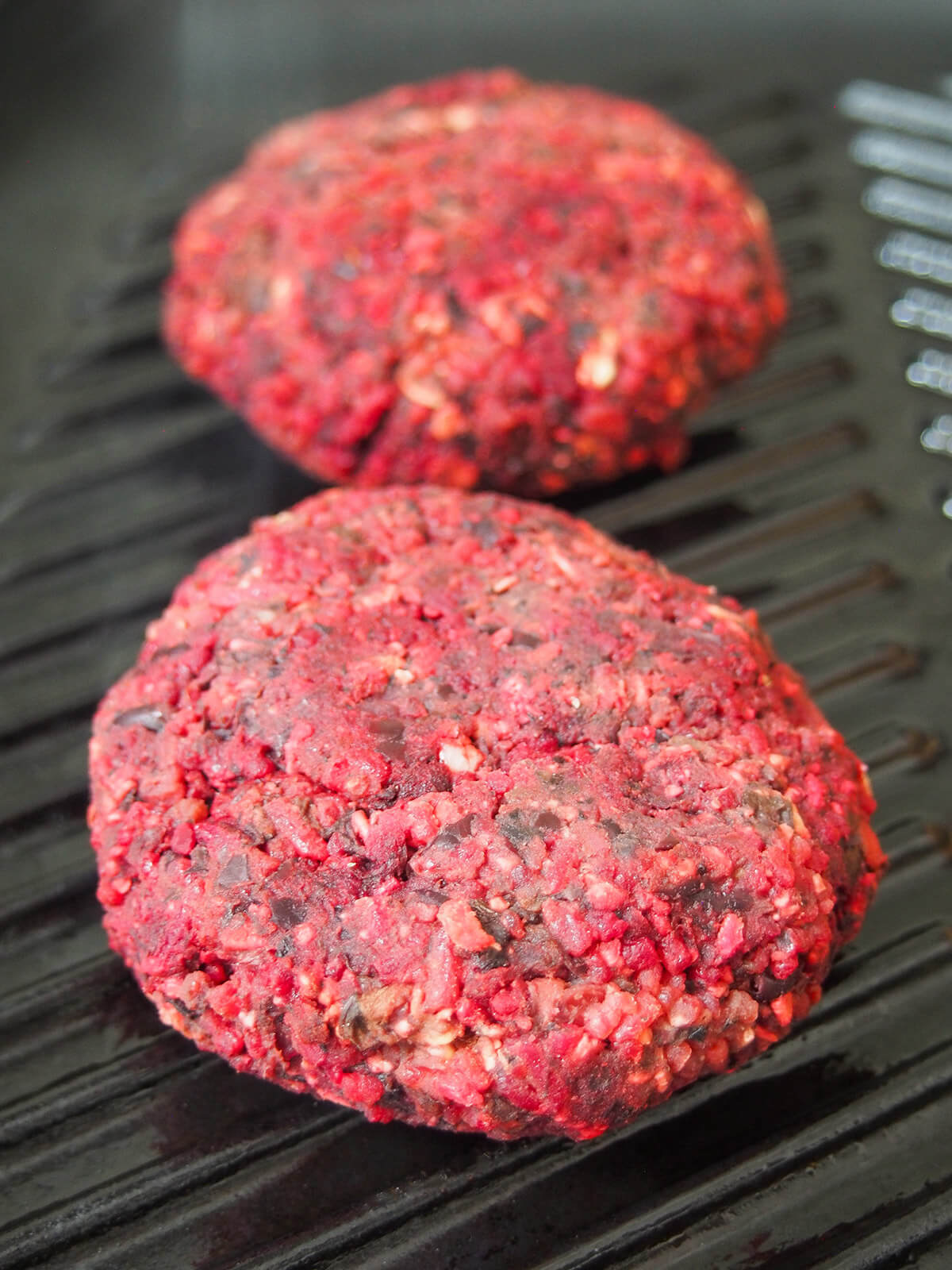 cooking black bean beet burgers on grill pan