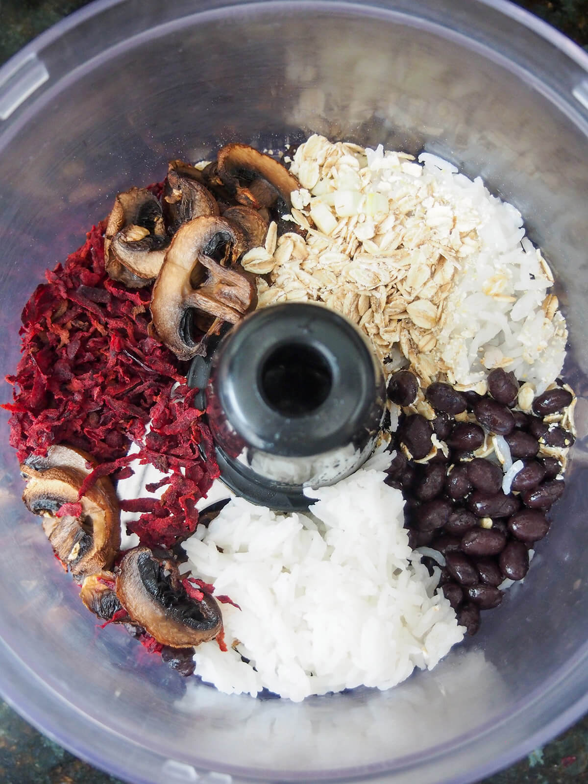 ingredients for black bean beet burger in food processor before blending