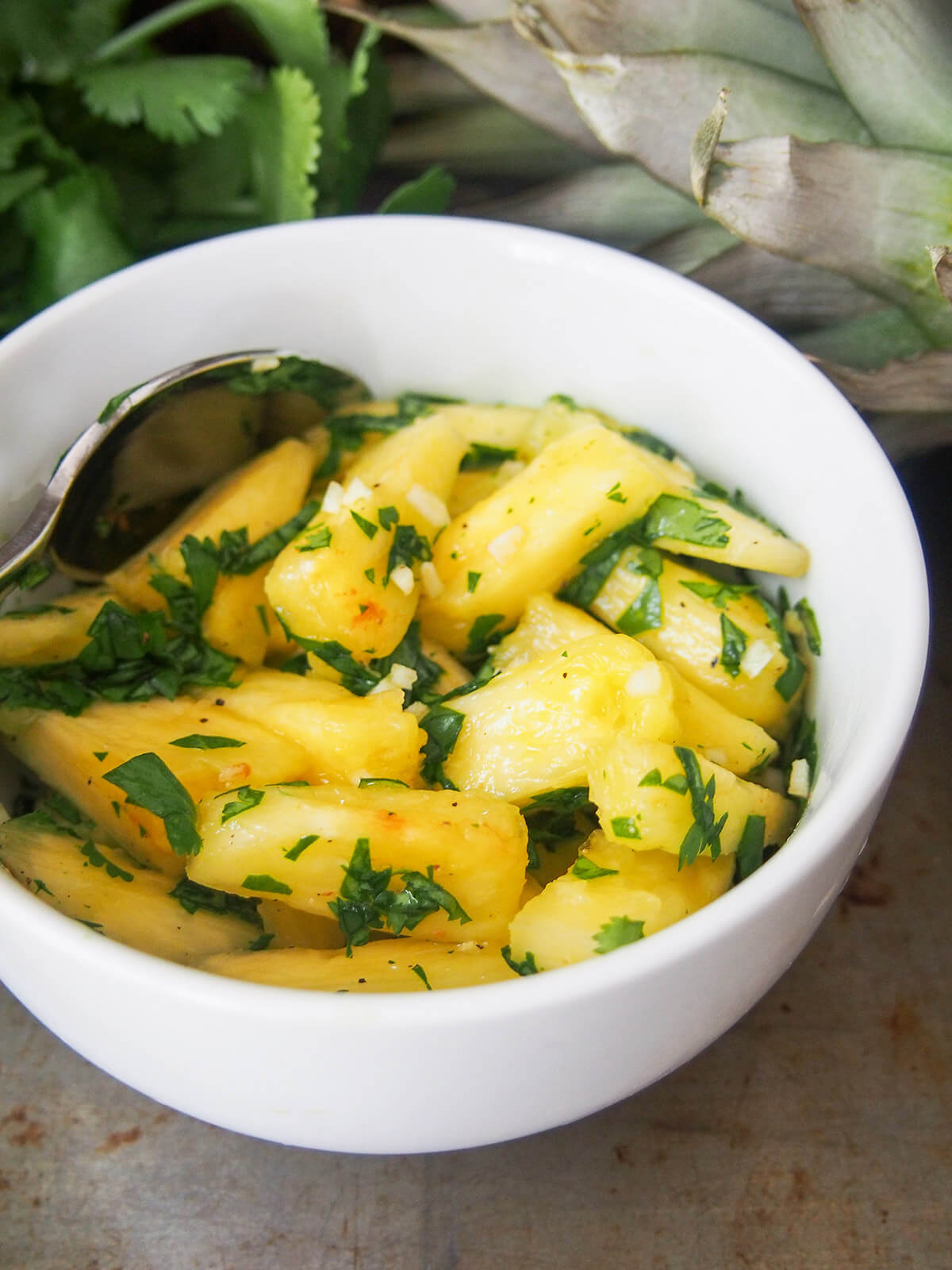 side view of bowl of pineapple chow