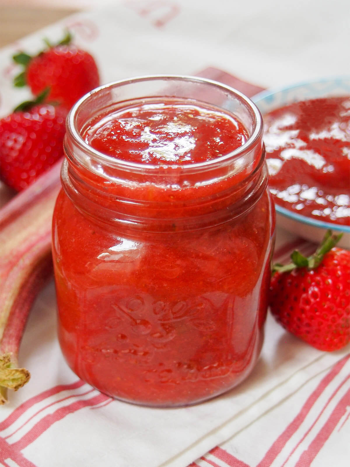 side close up view of jar of strawberry rhubarb jam