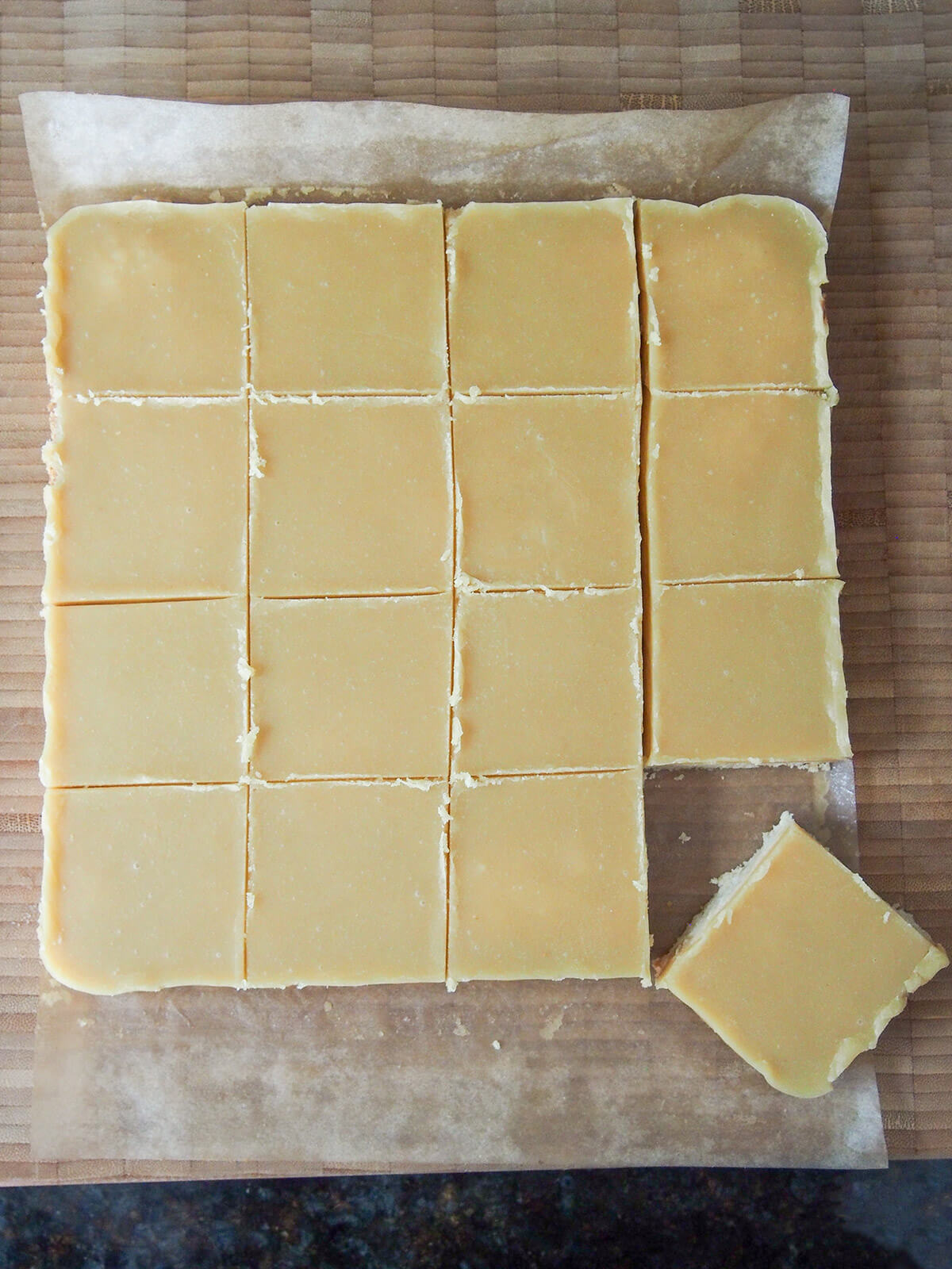 cutting ginger crunch slice into squares