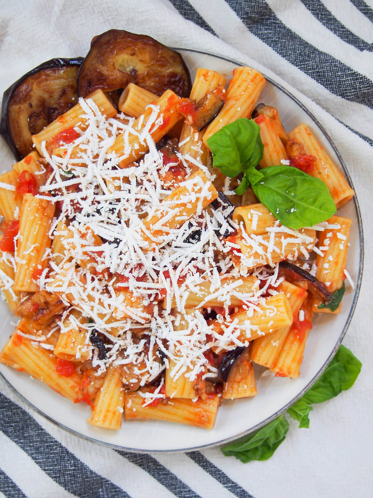 overhead view of plate of pasta alla Norma