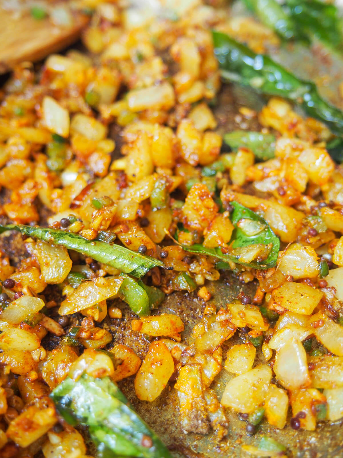 onion and spices browning in skillet