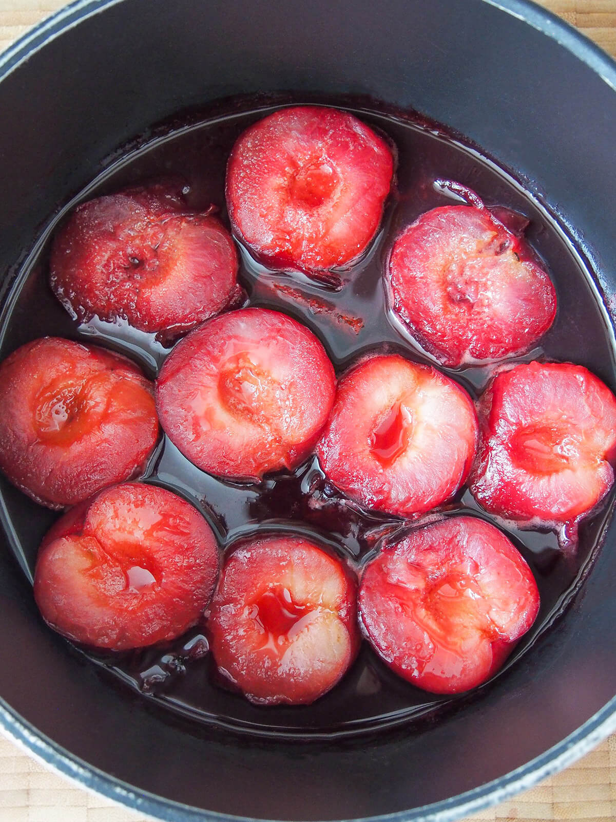 stewed plums cooling in pot