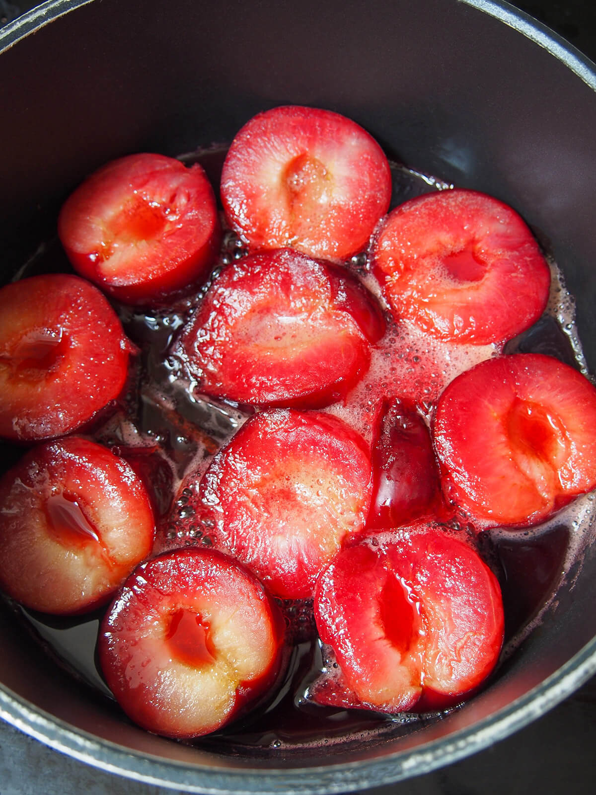 simmering stewed plums