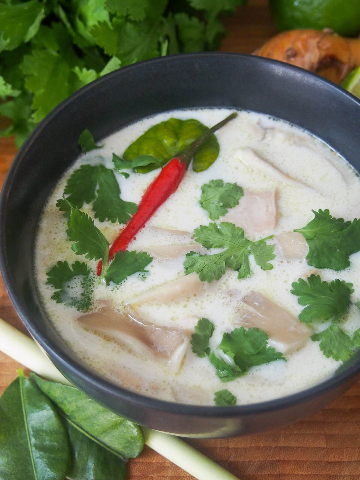 bowl of tom kha gai Thai coconut soup looking into bowl