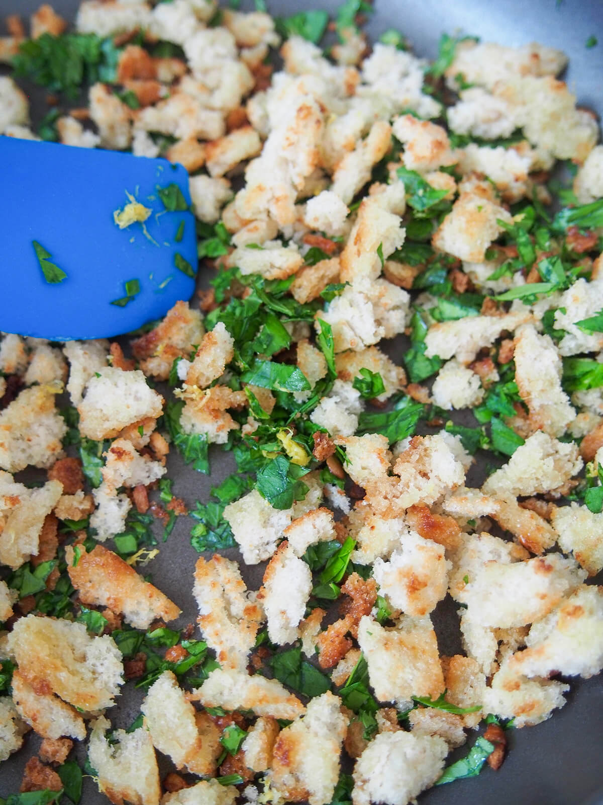 making lemon parsley pangrattato (toasted crumbs) in skillet