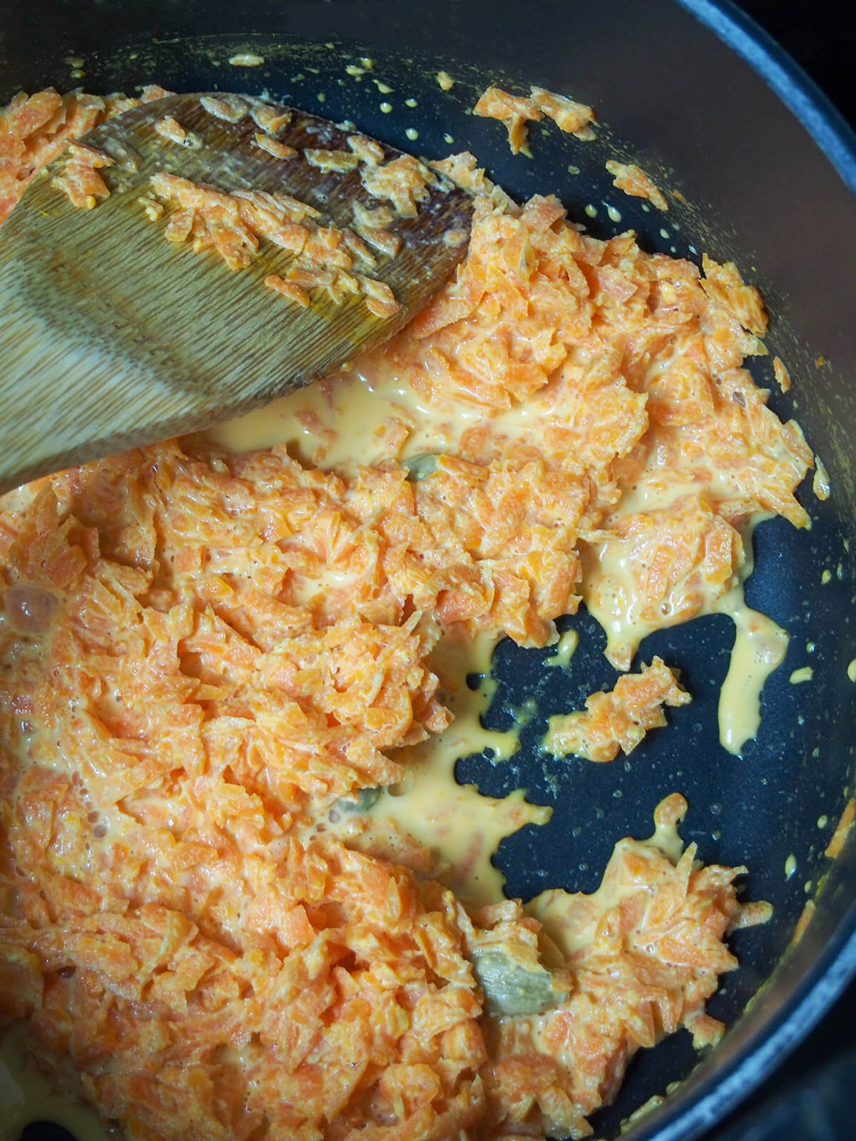 carrot mixture in pot with only a little liquid left.
