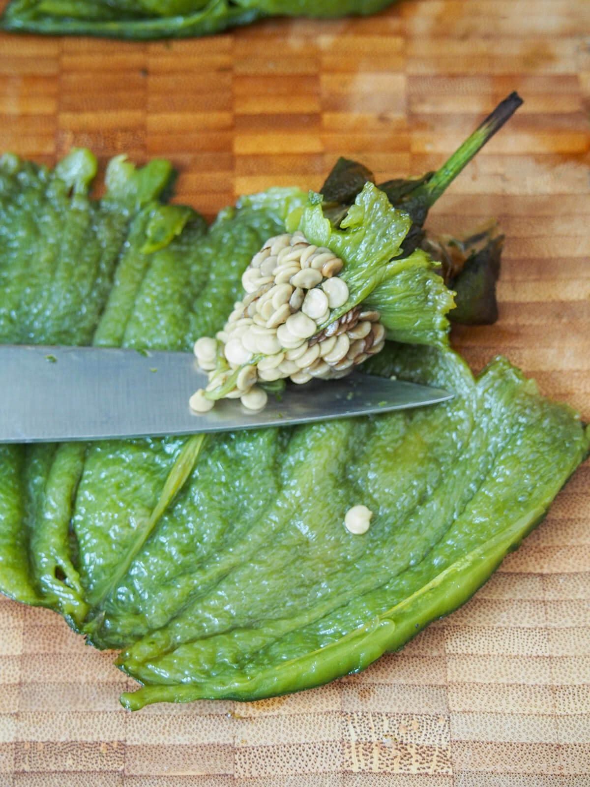 removing seeds from middle of roast poblano pepper