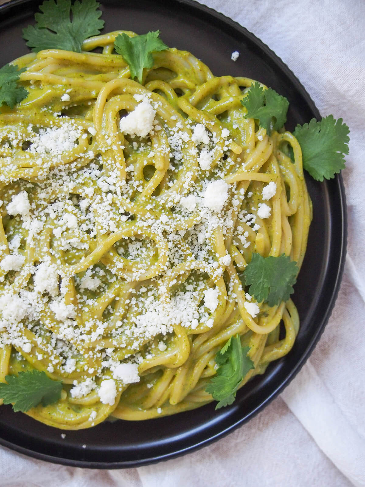 close view of plate of espagueti verde Mexican green spaghetti