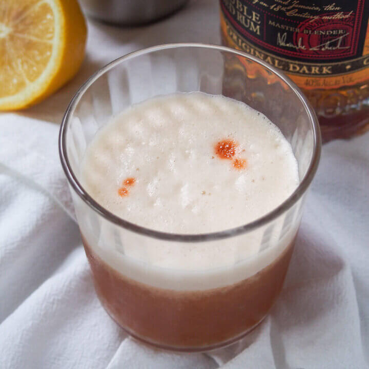 glass of rum sour close up.