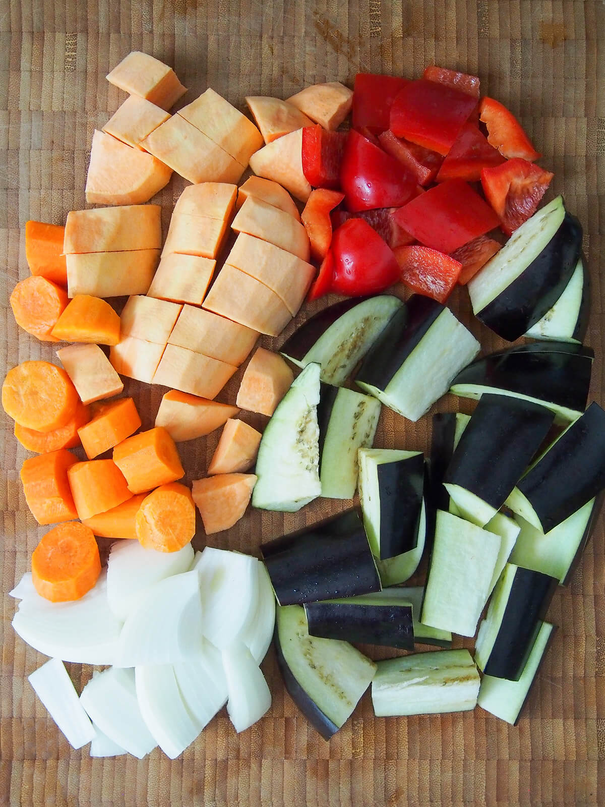 chopped vegetables on chopping board.
