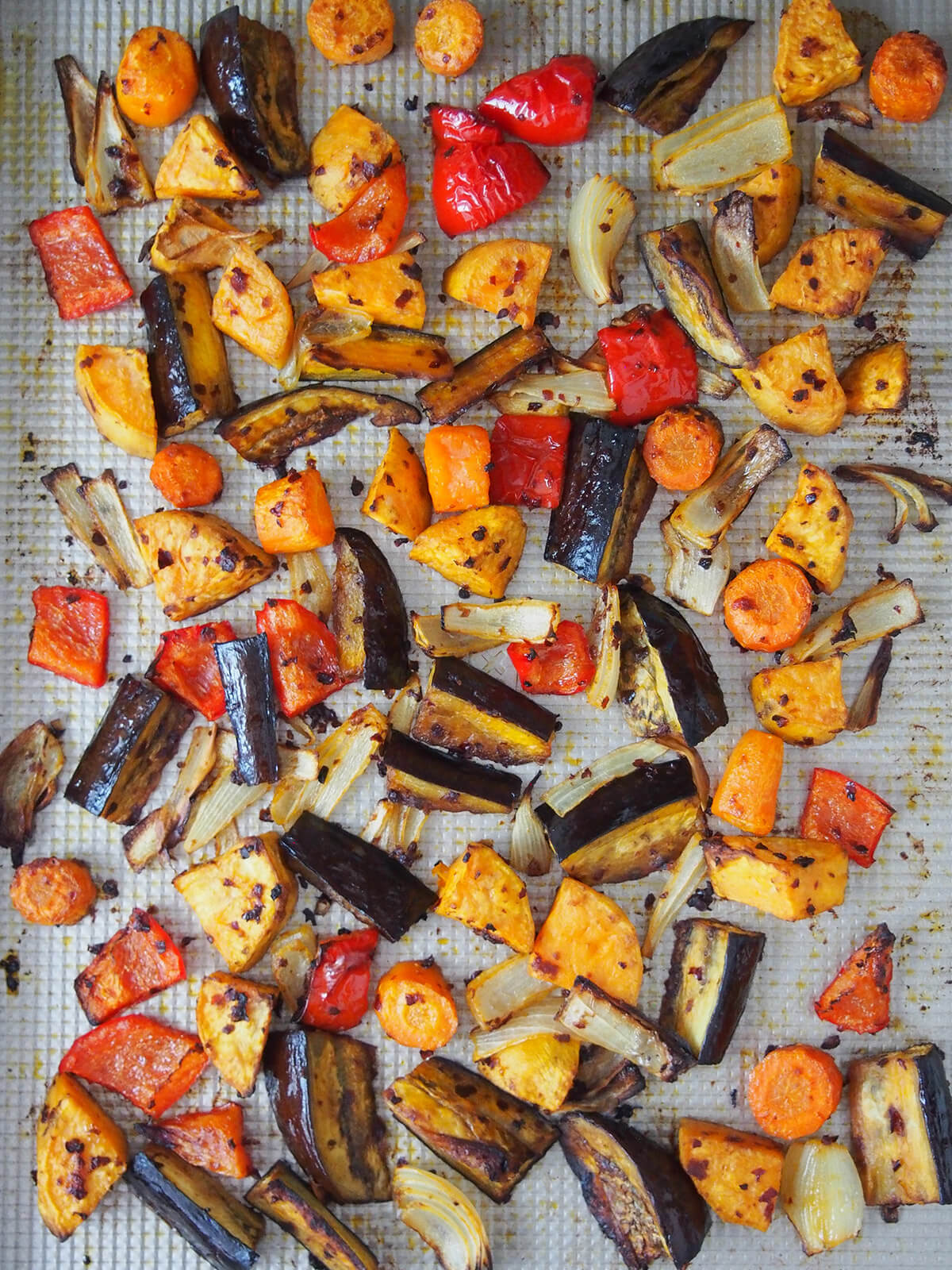 roasted vegetables on baking sheet.