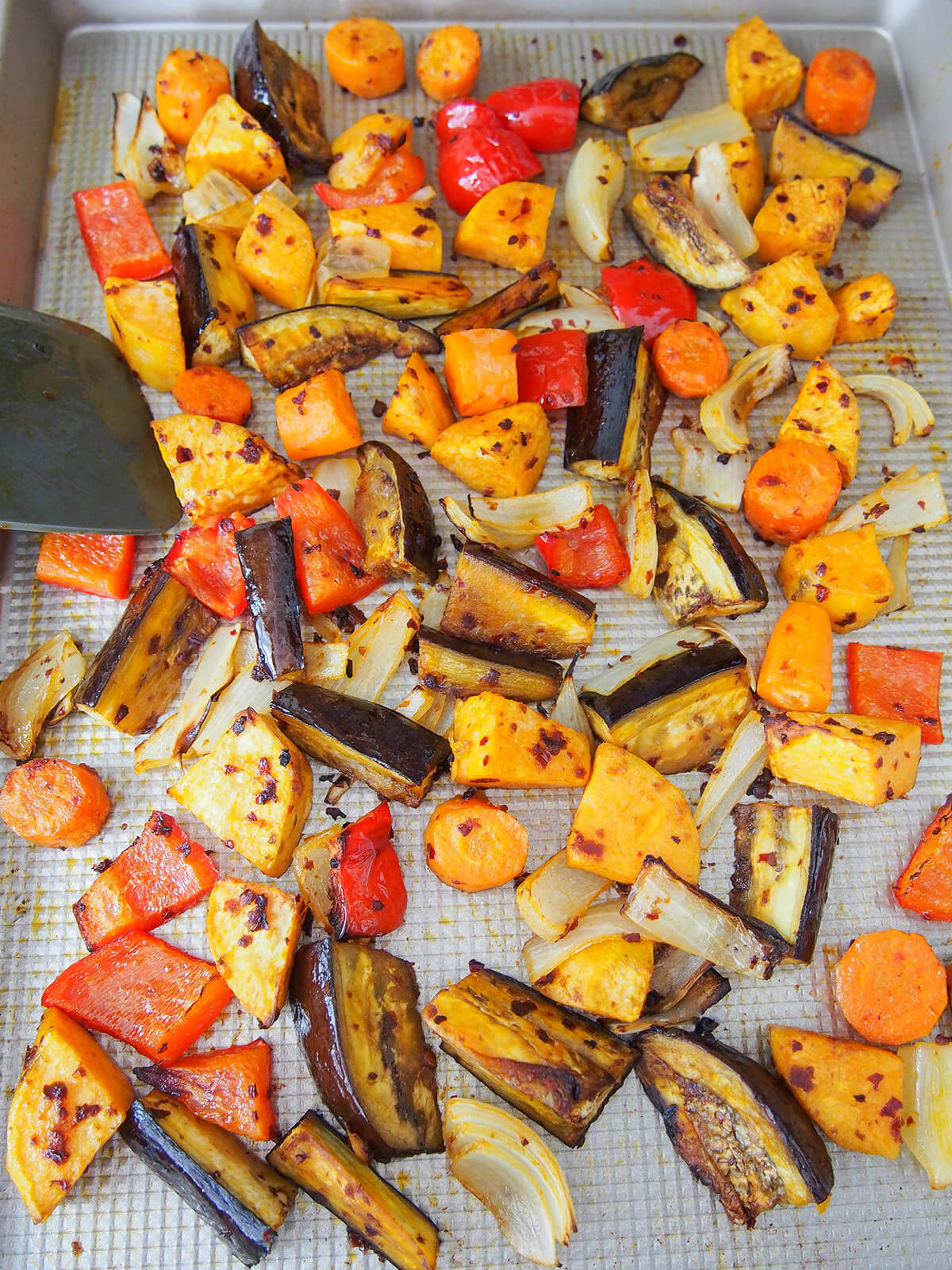 turning vegetables part way through cooking.