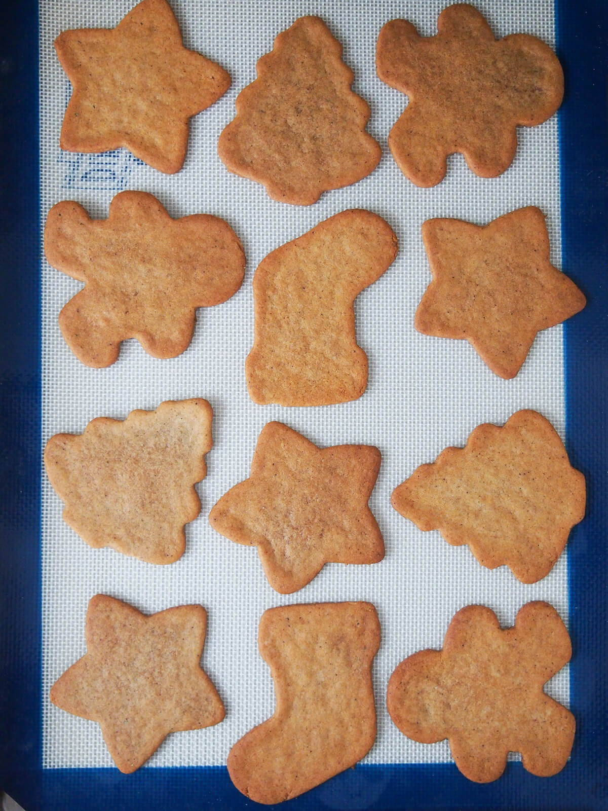 cookies cooling on lined baking sheet.