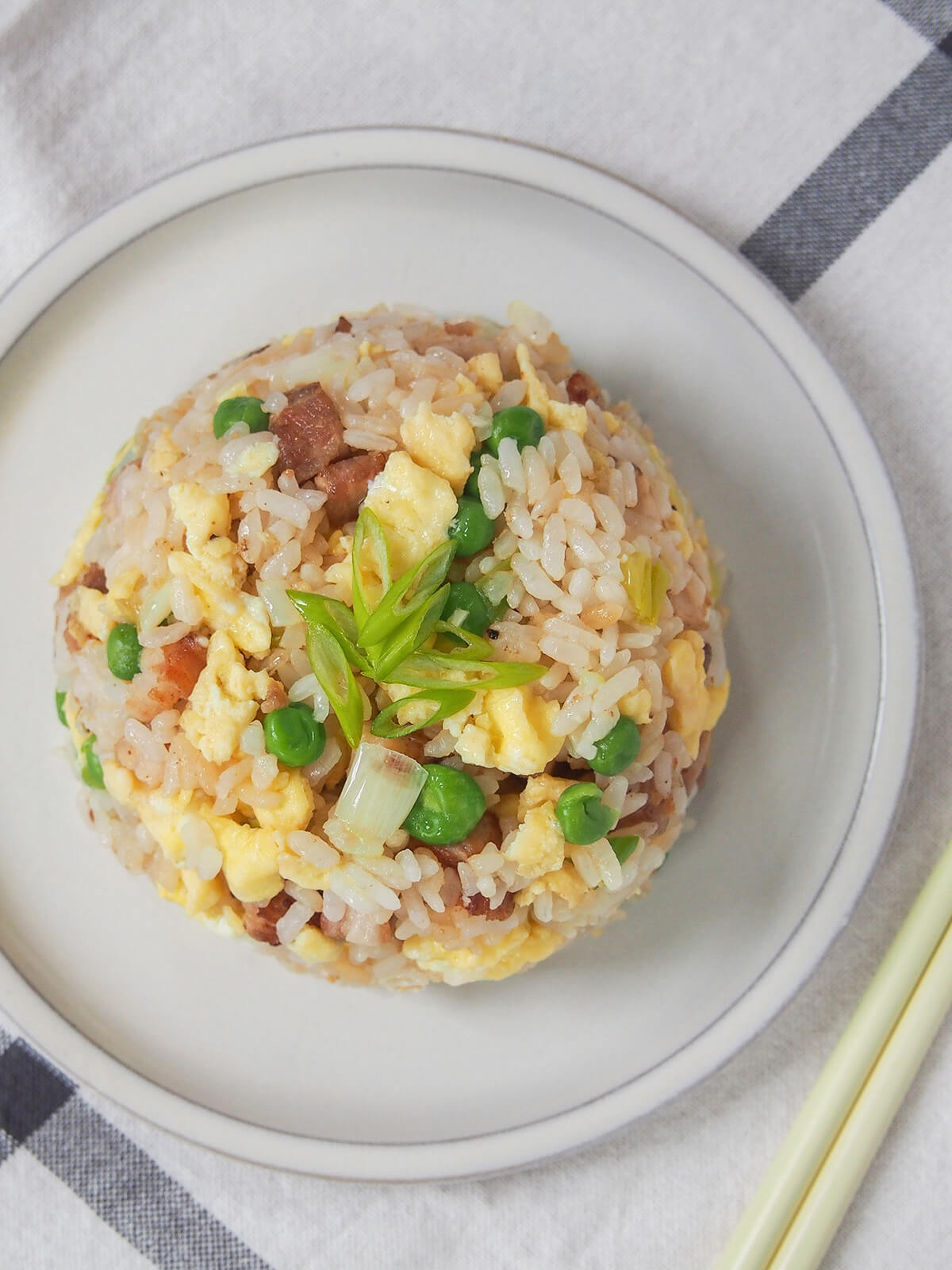 Chashu chahan is more than just a way to use up leftover chashu pork and rice - it's a delicious dish in itself. This simple Japanese fried rice is quick to prepare, with just a few ingredients. Perfect as a lunch, or serve it as a side with other dishes.