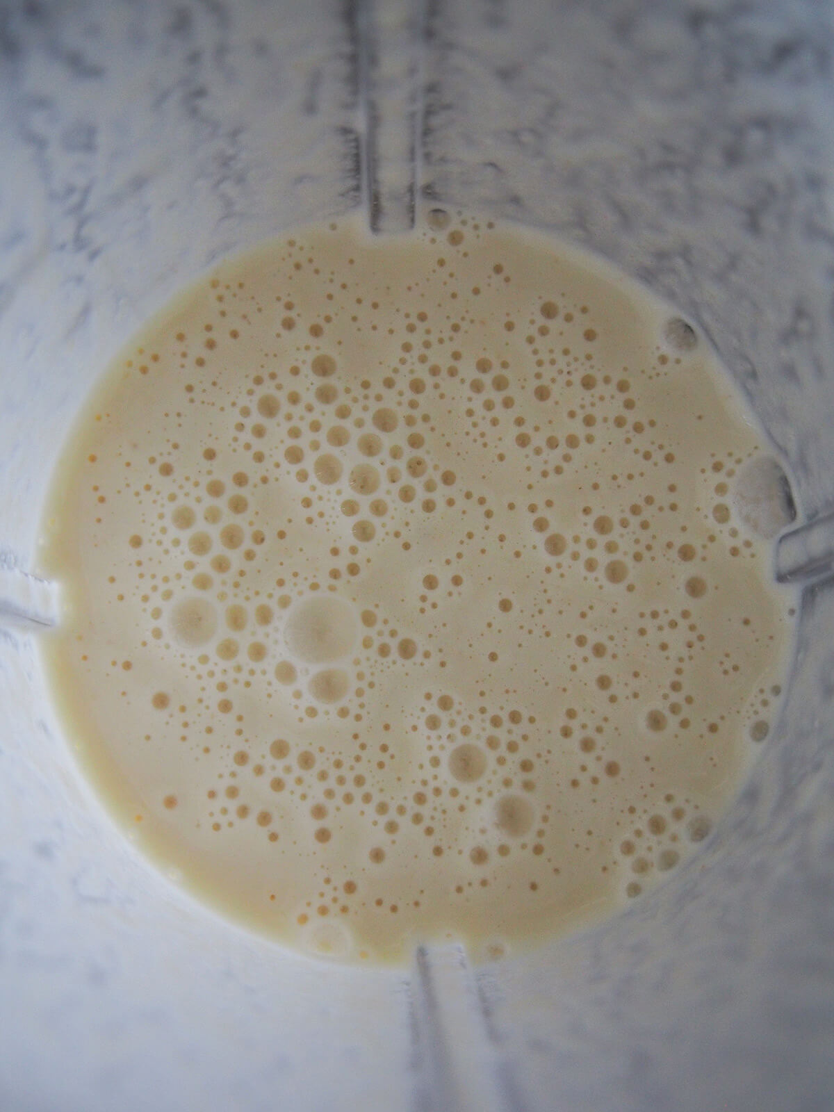 batter for baghrir, Moroccan semolina pancakes pancake batter in blender with bubbles on top.