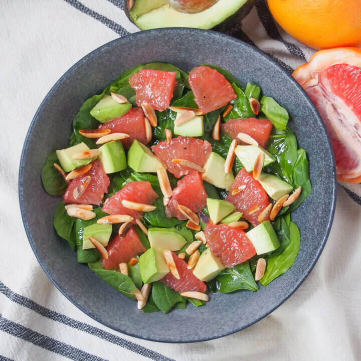 overhead view of a bowl of avocado grapefruit salad.