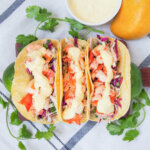 three lobster tacos in a row.