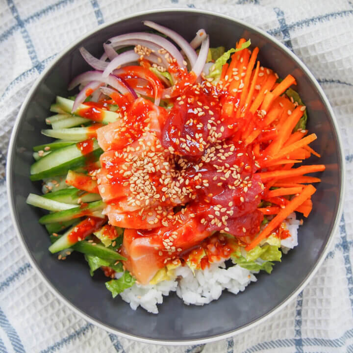 Korean sashimi rice bowl, hoedeopbap, from overhead.
