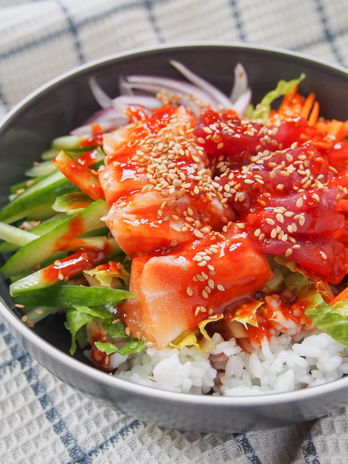 side close view of Korean sashimi rice bowl, hoedeopbap.