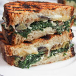 close view of eggplant spinach grilled cheese sandwich.
