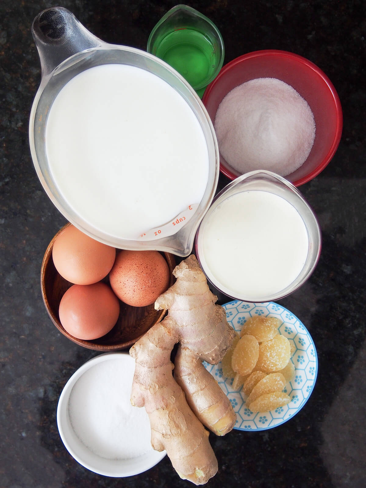 measures with cream, milk, bowls of sugar, eggs, ginger.
