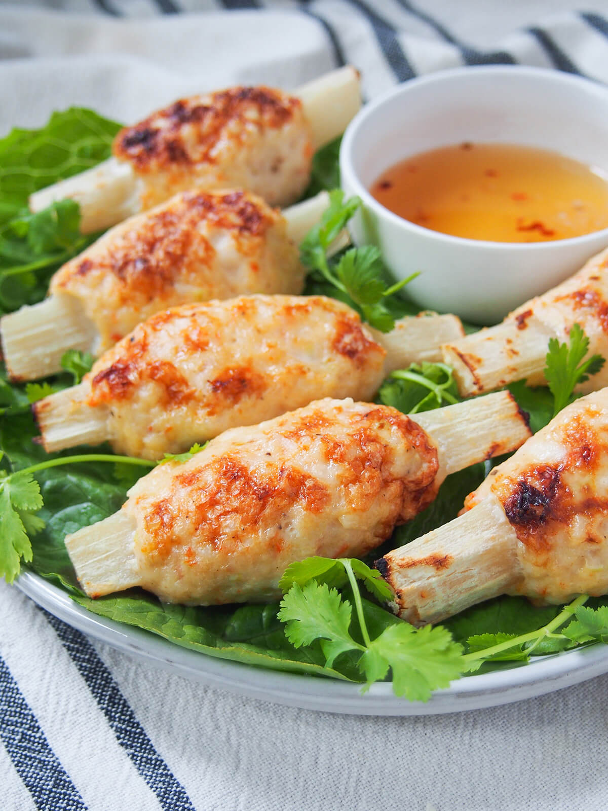 close view of Vietnamese sugarcane shrimp on plate.