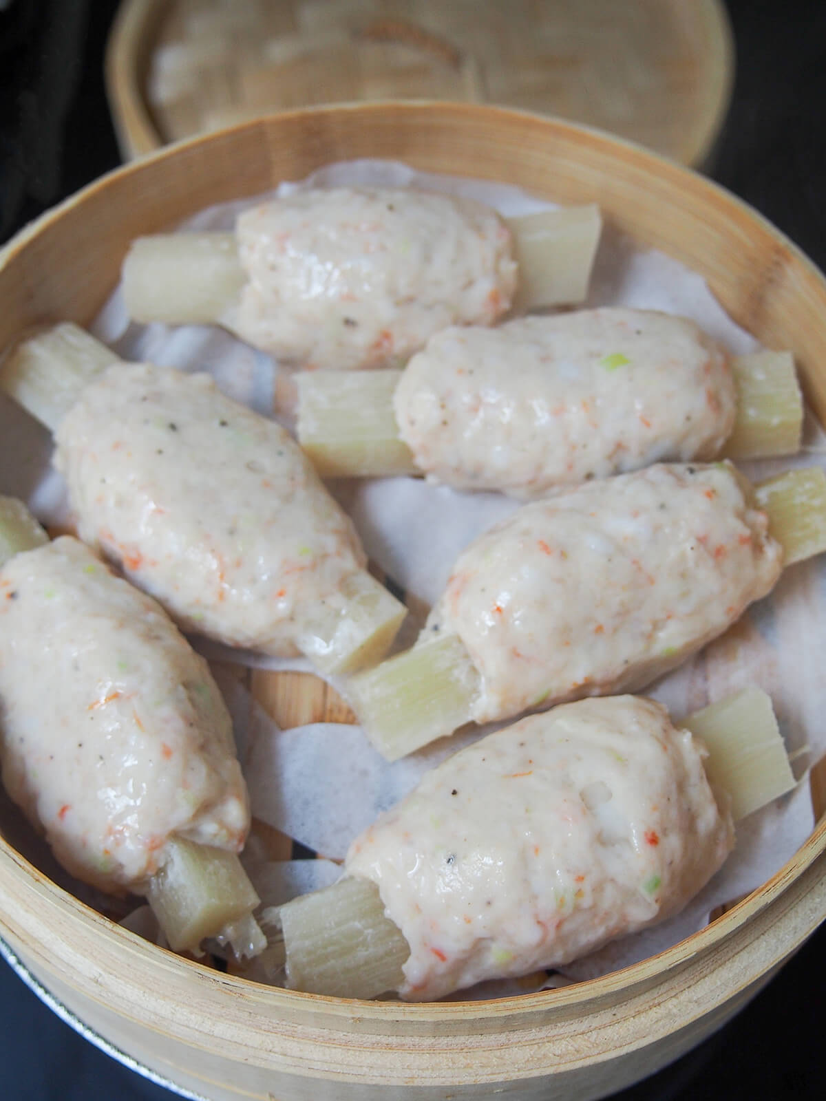 steamed Vietnamese sugarcane shrimp in steamer before finishing under grill.
