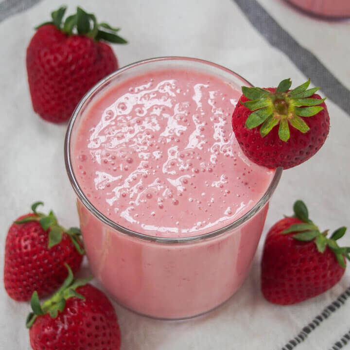 glass of strawberry lassi.